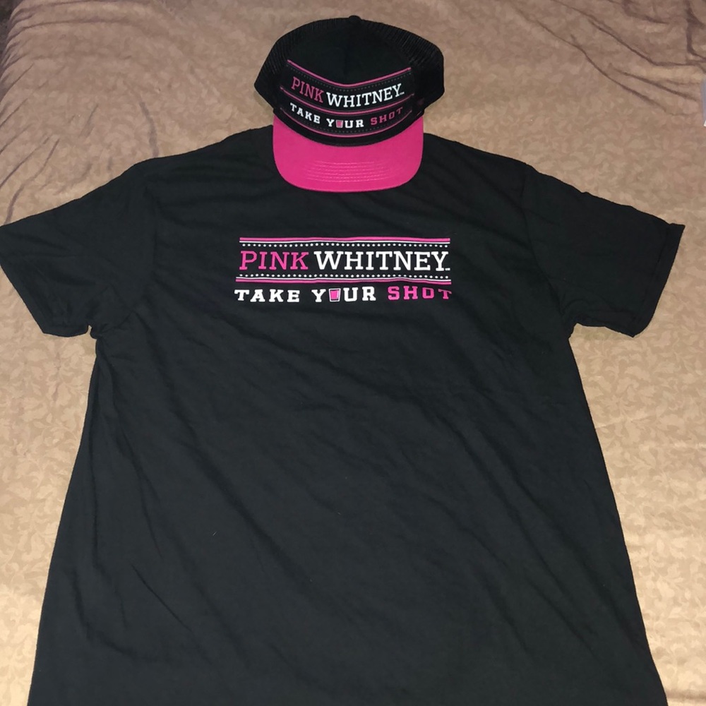 Pink Whitney shirt 👚 and trucker hat